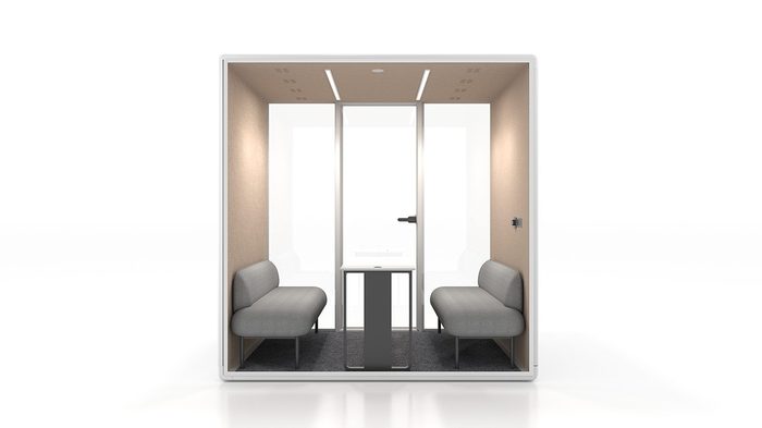 Fortress L four-person conference pod in white with tan interior — rear view