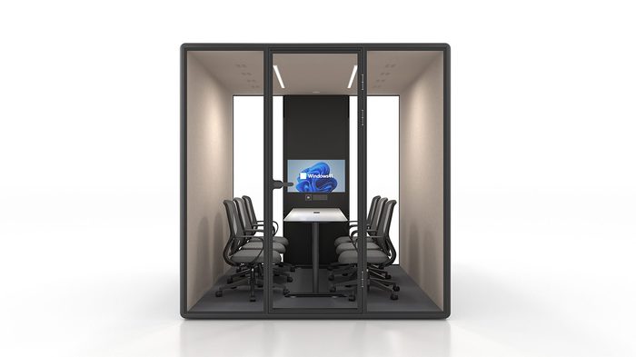 Fortress XL six-person boardroom pod in black with tan interior — front view